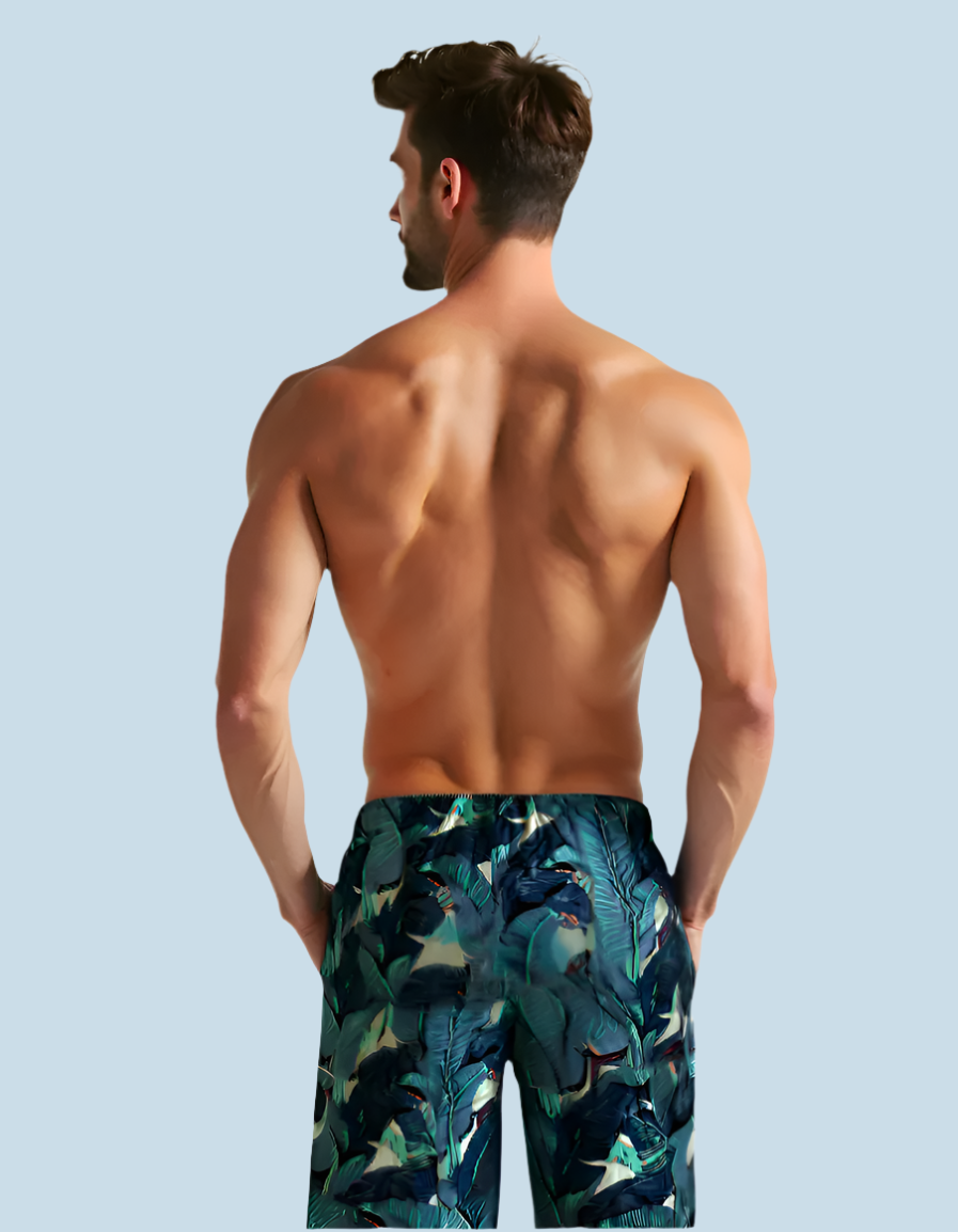 Back view of man wearing only the shorts from the N Faria Blue Leaf Luxe PJ Set.