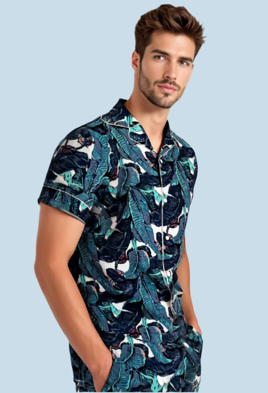 Front view of man wearing N Faria Blue Leaf Luxe PJ Set, standing confidently.