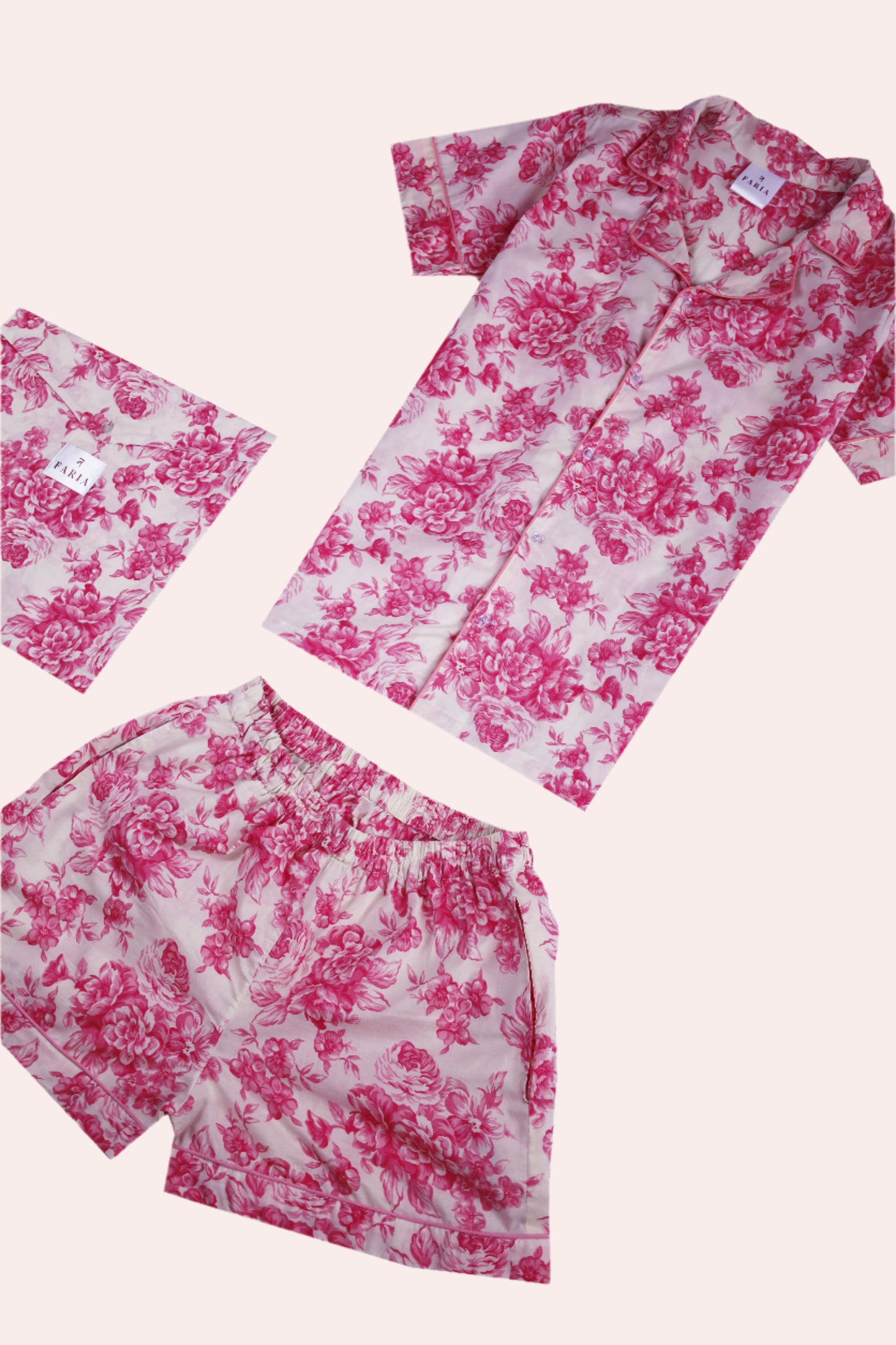 Angled flat lay of N Faria Rosé Luxe PJ Set - cotton shirt and shorts in floral pattern