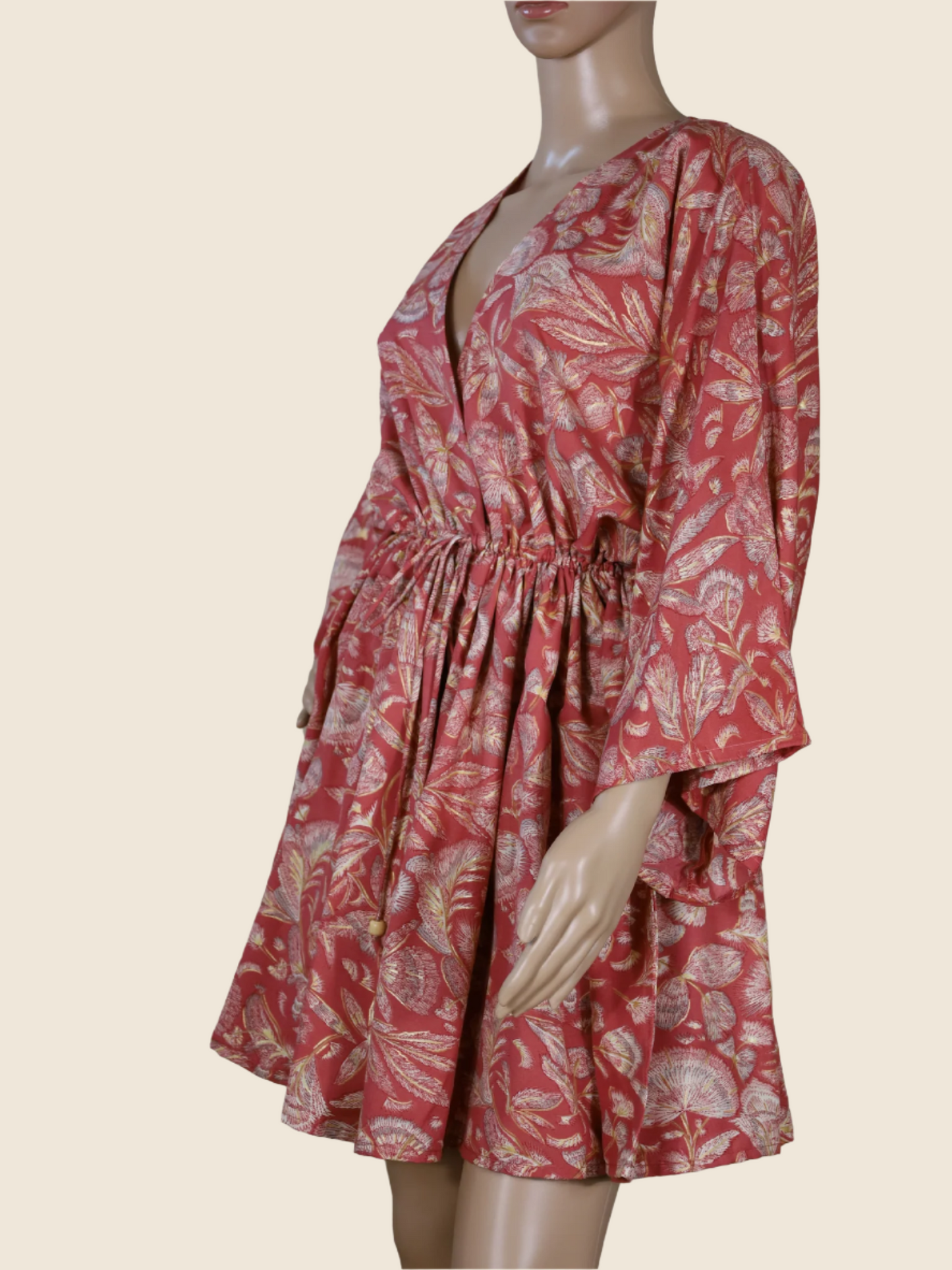 Angled front view of The Solace Kaftan by N Faria showing relaxed short fit