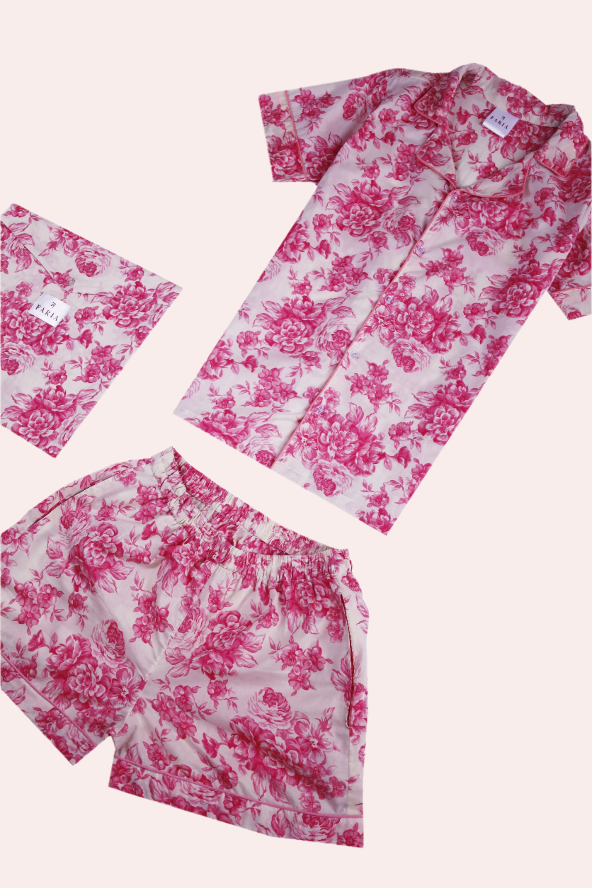 Angled flat lay of N Faria Rosé Luxe PJ Set - cotton shirt and shorts in floral pattern